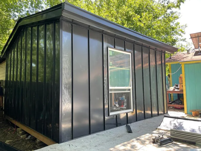 Black standing seam metal wall panels for Roof Inspection in Daphne