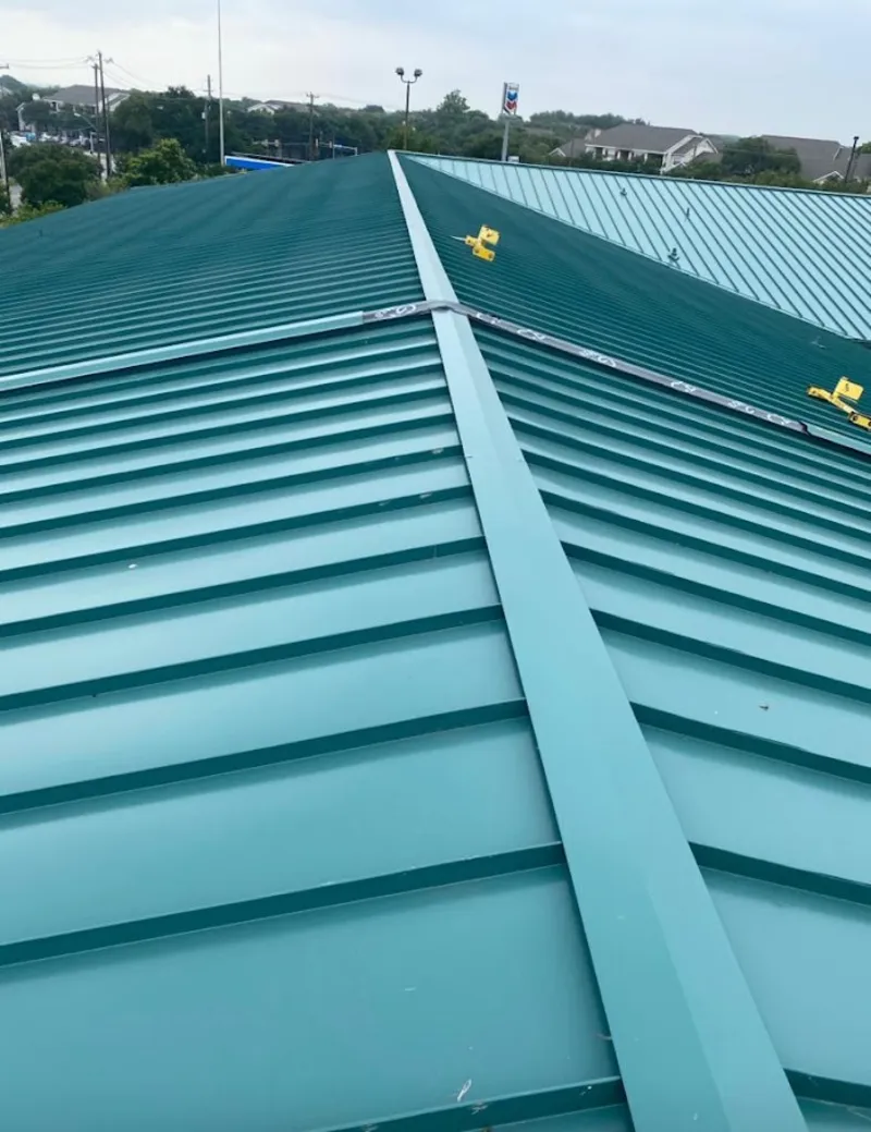 Green commercial metal roof ridge and valley for Metal Roof Repair in Daphne